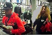 The two armed robbery suspects stealing merchandise at a business near the 2000 block of East S ...